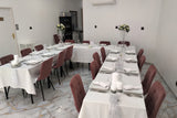 Tables dressées à l'occasion d'une réception au sein des DesLysGourmands Béthune, salle de récéption.